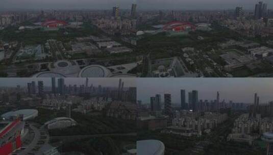 傍晚航拍南京奥体中心和附近高楼高清在线视频素材下载