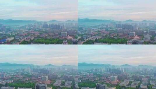 日出中的杭州滨江建筑风景航拍高清在线视频素材下载