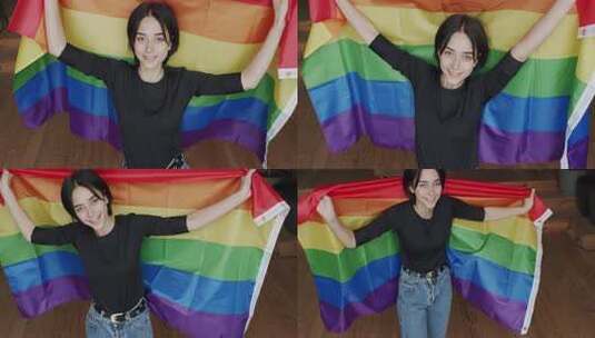 Lgbt妇女与骄傲彩虹旗帜拥抱和拥抱在家高清在线视频素材下载