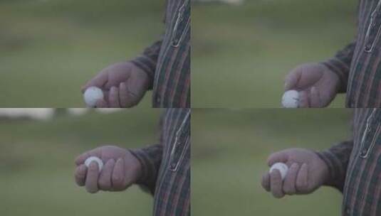 男人把高尔夫球抛起来高清在线视频素材下载