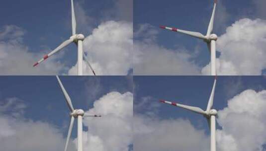 晴天下运作旋转的风力发电机高清在线视频素材下载