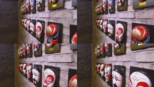 4K升格实拍挂在墙上的京剧脸谱装饰高清在线视频素材下载