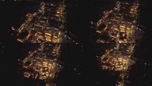俯瞰古建筑商业街步行街夜景亮化后飞摇城市高清在线视频素材下载