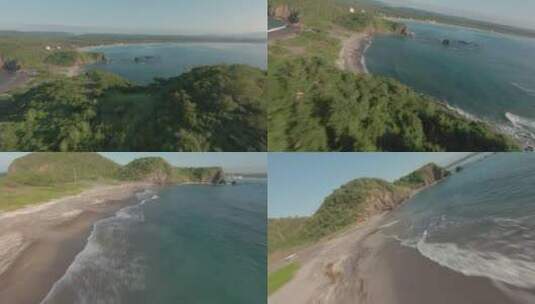 无人机飞越阳光明媚的半岛高清在线视频素材下载