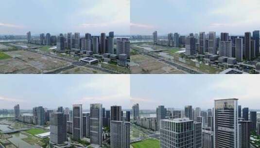 4K航拍蓝天白云下杭州亚运村城市建筑高清在线视频素材下载