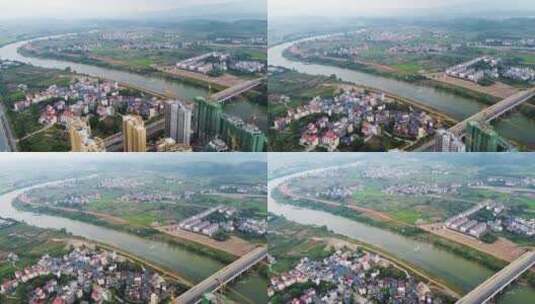 航拍江西省永新县蜿蜒的禾水和村庄高清在线视频素材下载