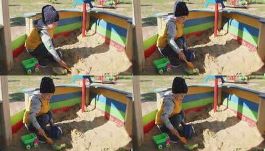小男孩在玩沙子高清在线视频素材下载