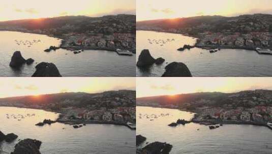 空中，西西里海岸旅游小镇阿奇·特雷扎的日落高清在线视频素材下载