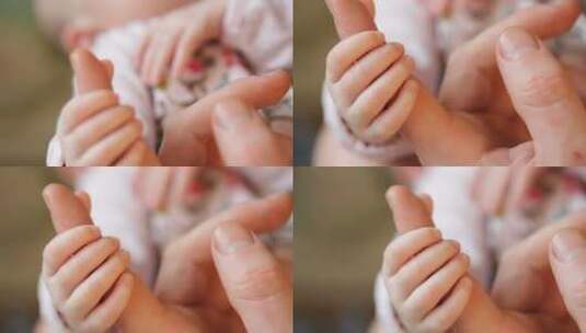 拿起婴儿粉嫩的小手指高清在线视频素材下载