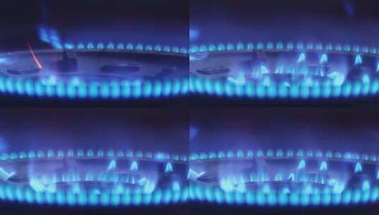 燃气灶上亮起蓝色的火焰高清在线视频素材下载