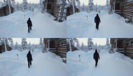 女孩走向北极圈拉普兰雪域冬季仙境的小屋高清在线视频素材下载