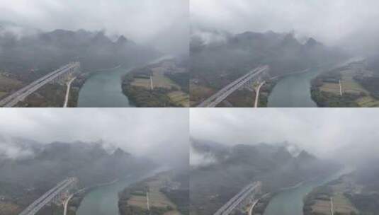 航拍云雾缭绕的广东清远连江畔高速公路高清在线视频素材下载