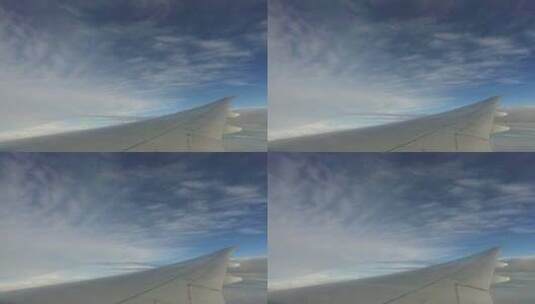 在蓝天中飞行的飞机机翼16高清在线视频素材下载
