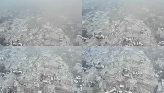 大自然寒潮冬天下雪的村庄田野航拍风景高清在线视频素材下载