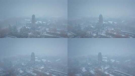 西安小雁塔雪景航拍高清在线视频素材下载