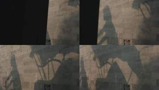 北京胡同什刹海三轮车胡同游墙上影子高清在线视频素材下载