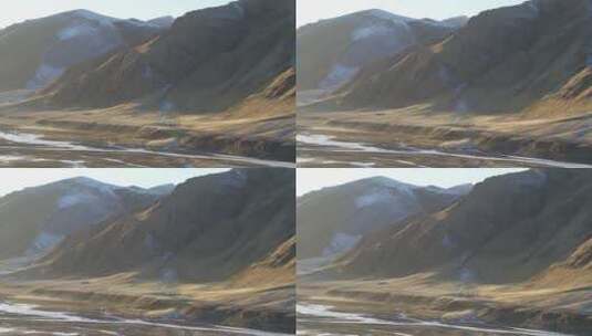 航拍青海西宁高原山脉脚下公路高清在线视频素材下载