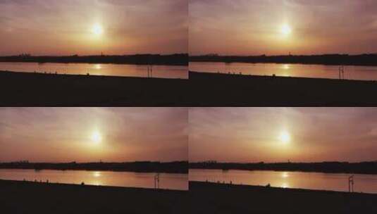 实拍夕阳西下的江边高清在线视频素材下载