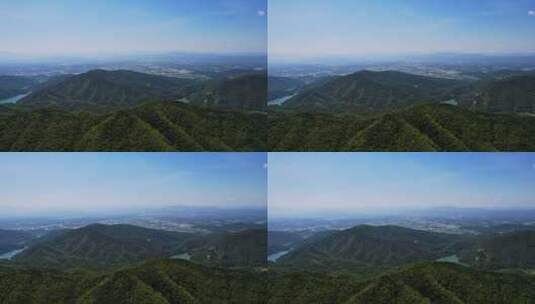 无人机飞过大山山头看见壮阔风景高清在线视频素材下载
