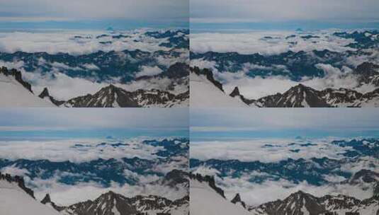 雪山顶上空的云层延时高清在线视频素材下载