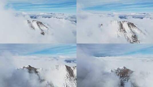 航拍云雾下的川西美丽雪山风景高清在线视频素材下载