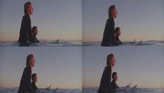 一男一女站在冲浪板上 高清在线视频素材下载