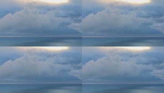 蓝色的云朵笼罩着大海高清在线视频素材下载
