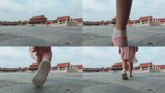 一个女孩独自走在北京故宫太和门的广场上高清在线视频素材下载