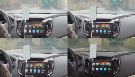 网约车司机使用手机APP导航驾驶城市道路高清在线视频素材下载