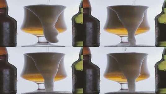 啤酒泡沫溢出到白色背景的玻璃杯中高清在线视频素材下载