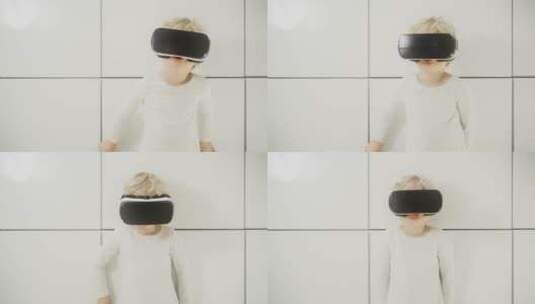 在VR中观看视频的男孩高清在线视频素材下载