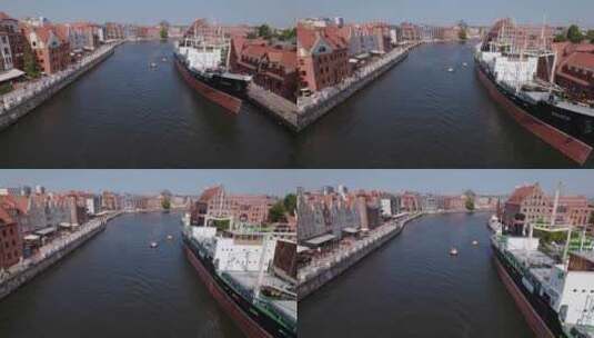 波兰格但斯克中心运河上游船航行的无人机视频高清在线视频素材下载