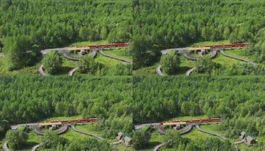 航拍莫尔道嘎国家森林公园观光小火车高清在线视频素材下载
