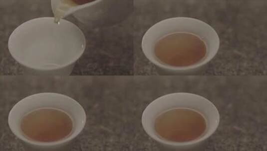 倒煮好的黑茶茶水高清在线视频素材下载
