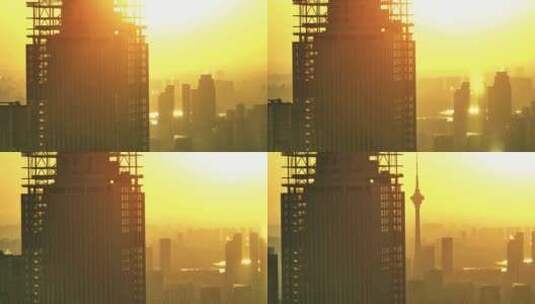 长焦航拍夕阳下的天津广播电视塔高清在线视频素材下载