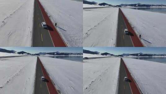 新疆雪中公路汽车行驶向远方雪山高清在线视频素材下载