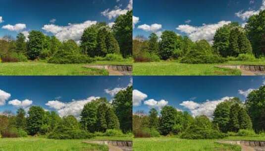 蓝天白云下的绿色公园高清在线视频素材下载