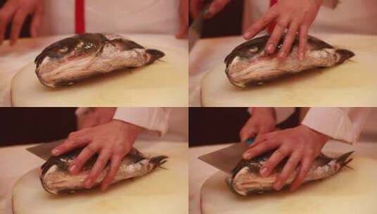 厨师切胖头鱼鱼头高清在线视频素材下载