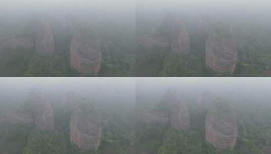 航拍迷雾下的丹霞大山高清在线视频素材下载