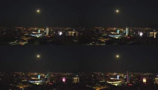 西安城市夜晚明亮的月亮体育场高清在线视频素材下载