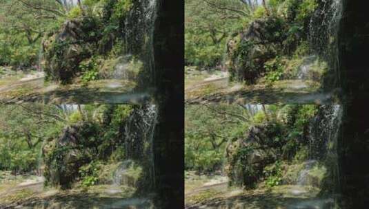 假山流水瀑布泉水小溪高清在线视频素材下载