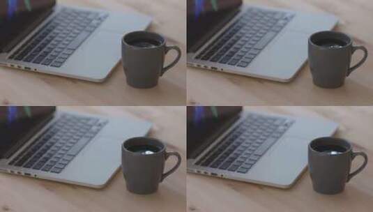 笔记本旁边的咖啡特写高清在线视频素材下载