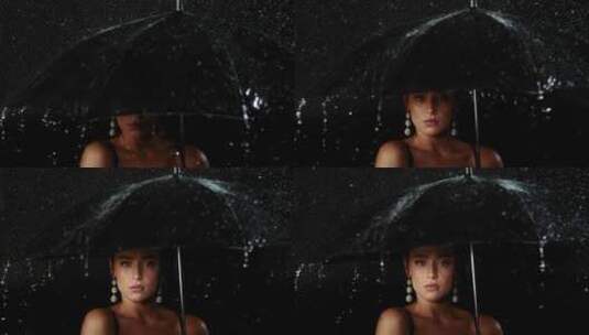 雨中打伞的女人高清在线视频素材下载