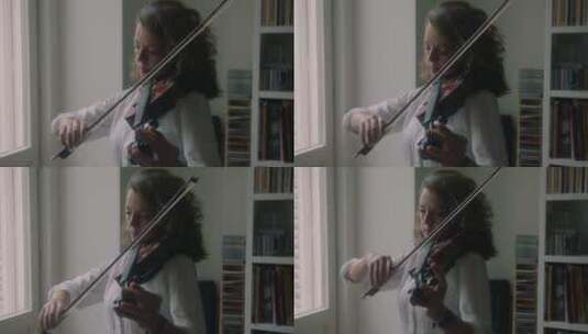 拉小提琴的女人高清在线视频素材下载