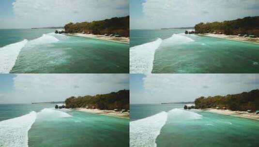 建立无人机沿着印度尼西亚巴厘岛巴东海滩的海岸线飞行高清在线视频素材下载