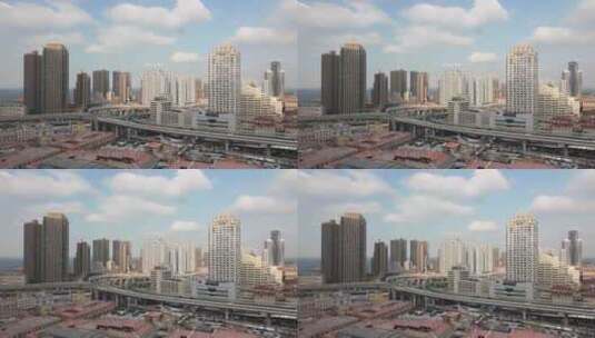 蓝天白云下青岛市区高楼大厦延时摄影高清在线视频素材下载