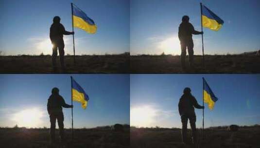 乌克兰女陆军士兵手持乌克兰国旗，背景是太高清在线视频素材下载