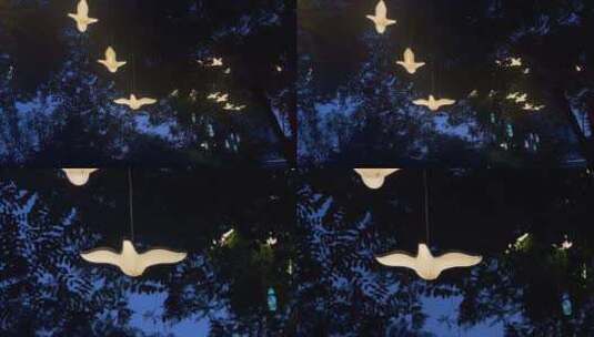 树木亮化飞鸟造型灯装饰高清在线视频素材下载
