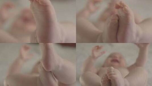 4K- 特写婴儿胖嘟嘟的小脚丫高清在线视频素材下载