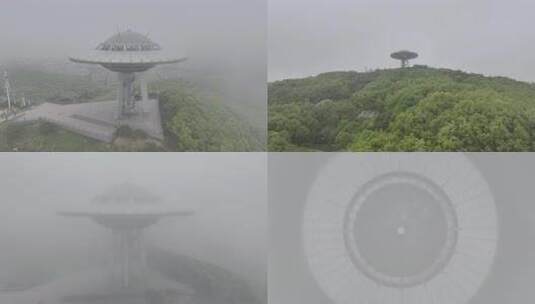 大连童牛岭雾中山顶的飞碟建筑高清在线视频素材下载